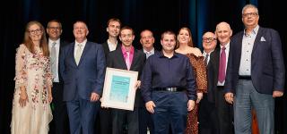 Group photo of the Good Sammy team after receiving their award