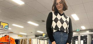 influencer standing in Ellenbrook Good Sammy with a thrifted outfit on.