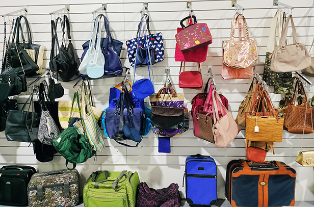 Wall of handbags on display at Good Sammy Wanneroo