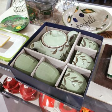 Pale green teapot with matching cups