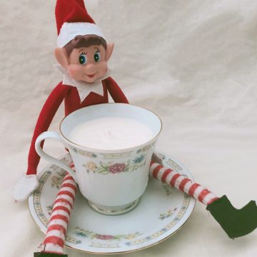Thrifted tea cup with candle inside