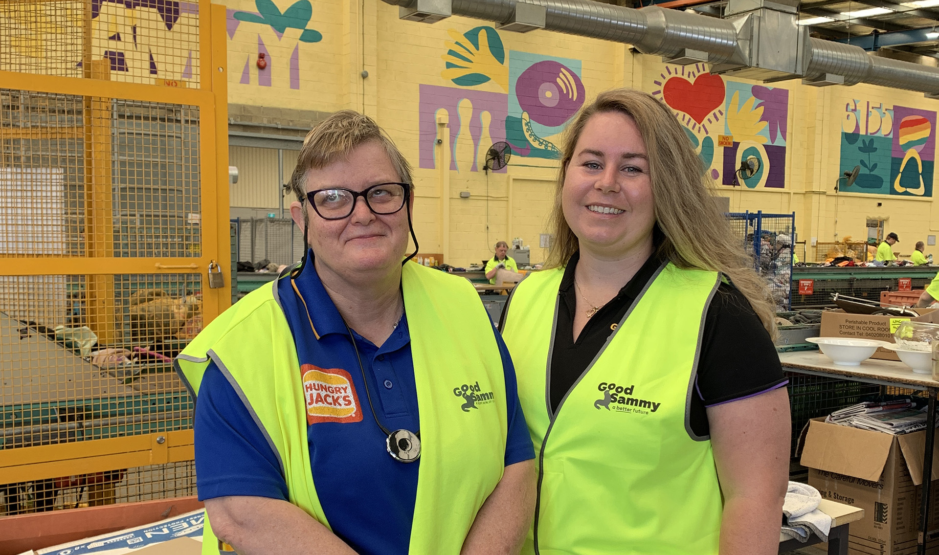 Good Sammy mentor, Tori, smiling with employee and NDIS Participant, Kelly.